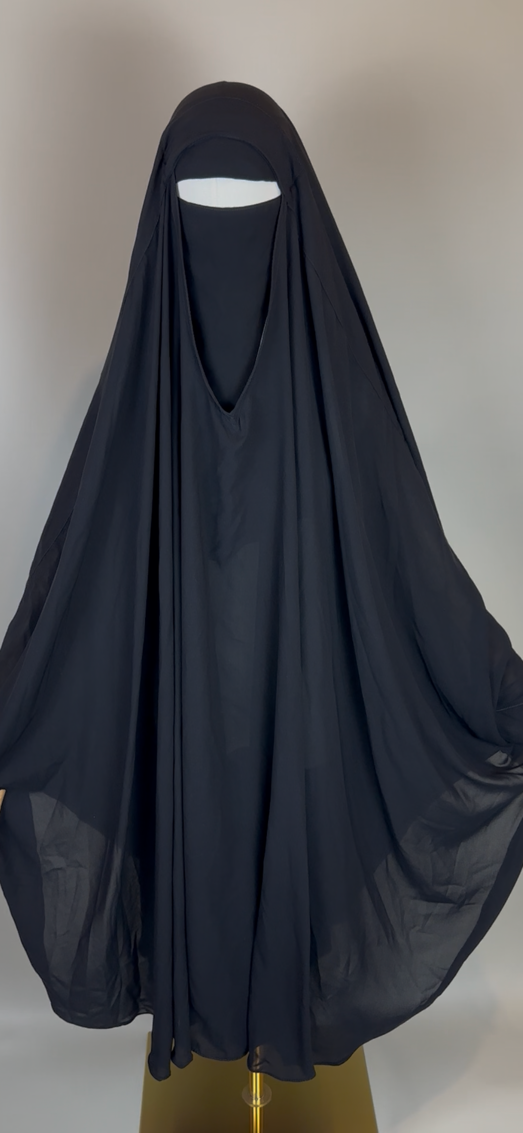 Black khimar jilbab with niqab style on mannequin, modest Islamic clothing