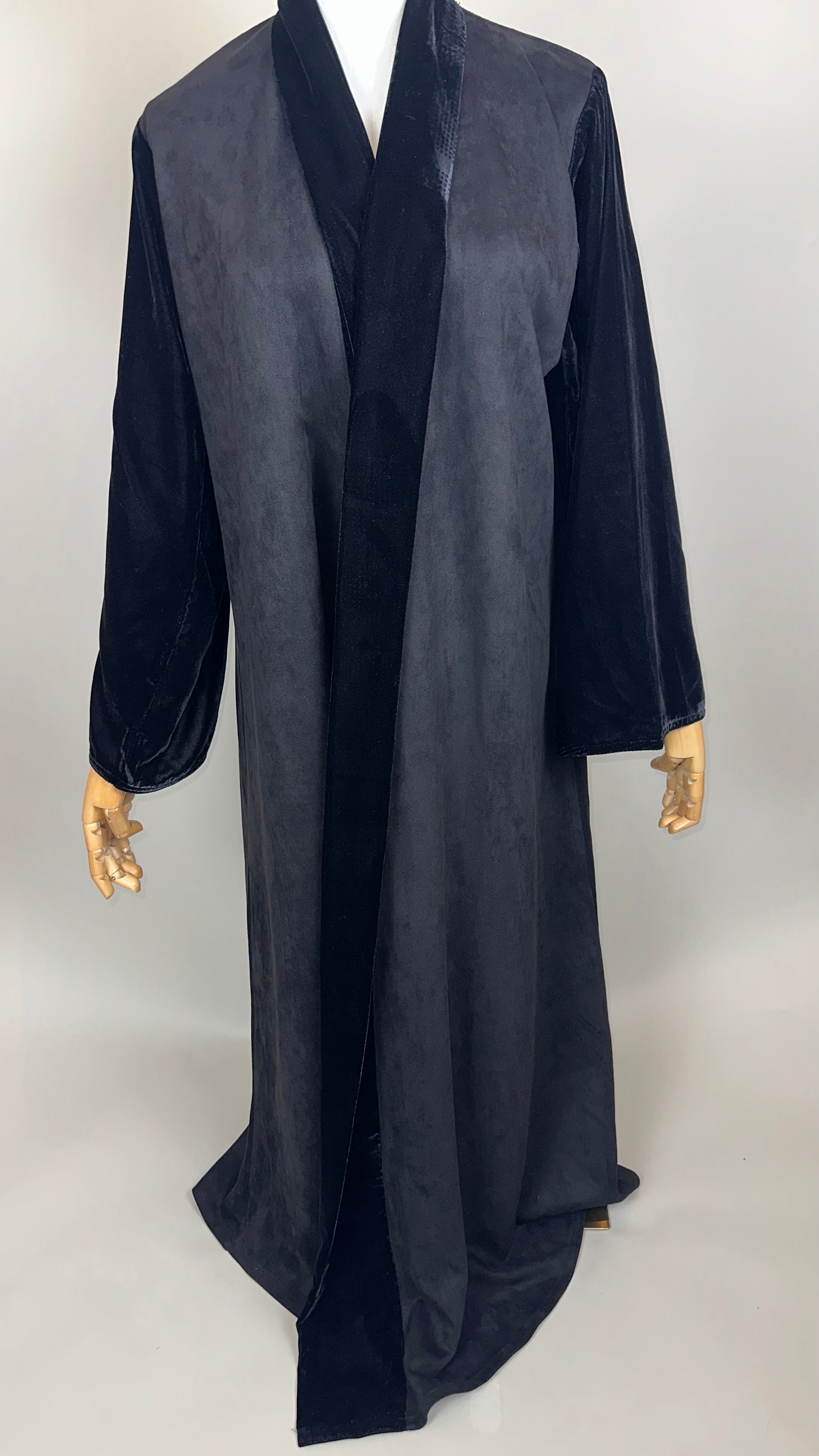 Black velvet long robe with wide sleeves on mannequin, luxury loungewear fashion